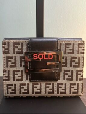 Authentic vintage Fendi Zucca bi-fold wallet.